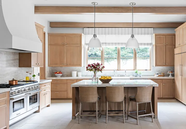 Kitchen with updated cabinetry, counters, and open workspace