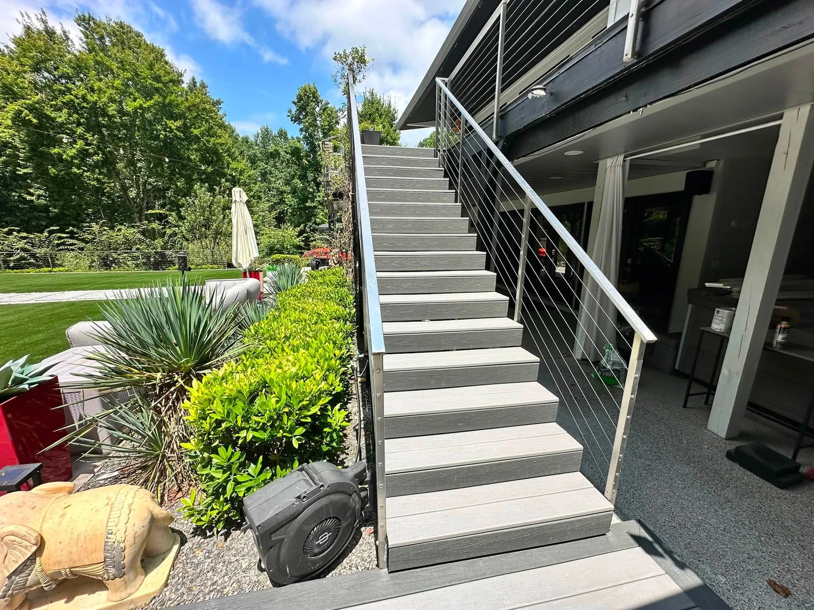 Custom composite stairs with metal railing