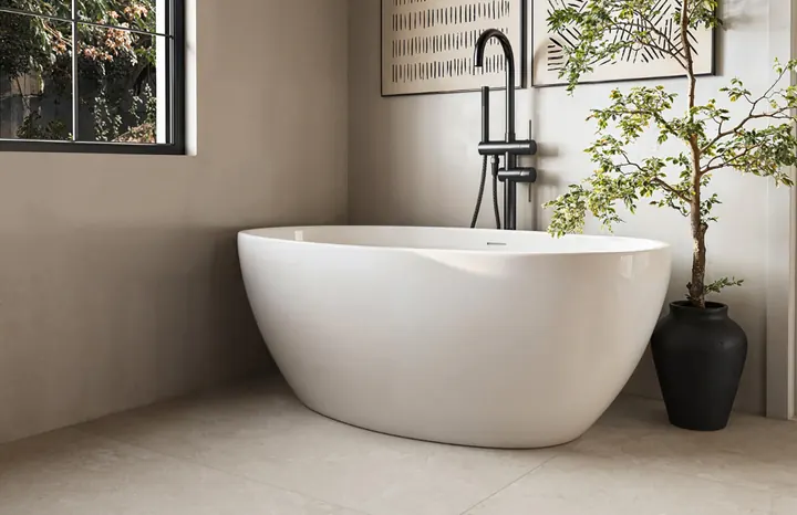 Bathroom with walk-in shower, tile, and refined fixtures